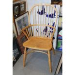 An ash and elm spindle back double hoop farmhouse elbow chair with panel seat and crinoline