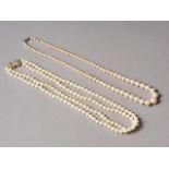A twin-strand cultured pearl necklace with 9ct gold clasp, 16" long, and a Ciro faux graduated pearl