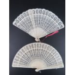 A late 19th / early 20th century 'Empire Made' cellulose pierced and decorated fan,