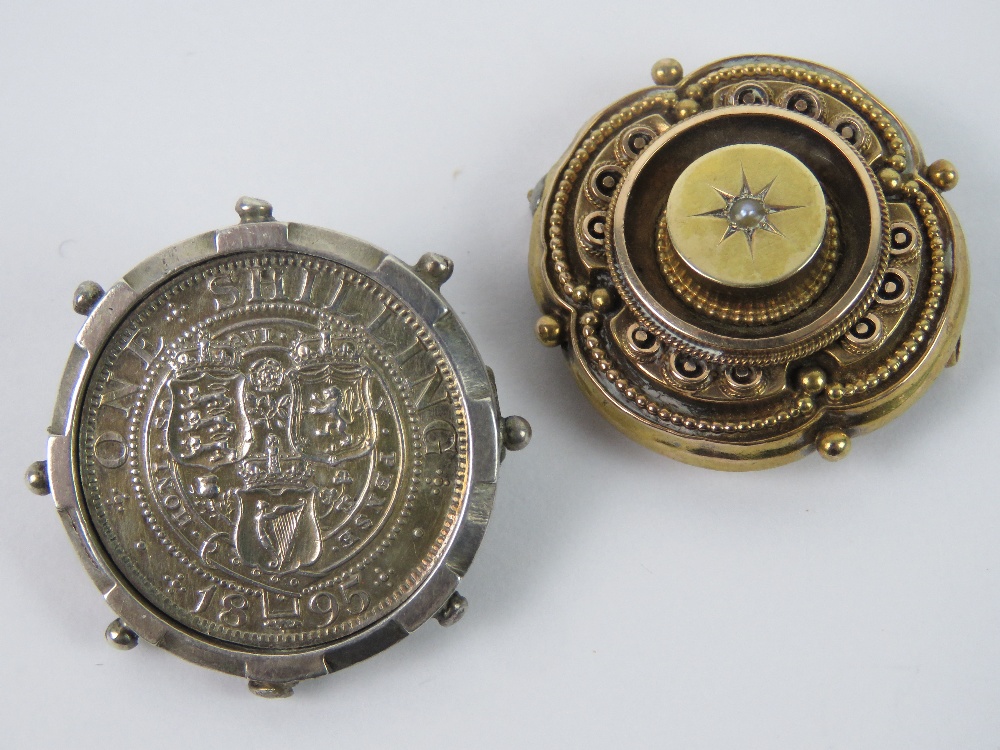 A late Victorian mourning brooch having glazed locket verso,