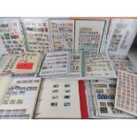 A large collection of mostly 20th century stamps within various books / albums.