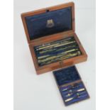A fine Negretti and Zambra draftmans set containing various compasses and associated equipment,