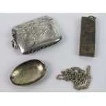 A HM silver vesta case having foliate engraved pattern to both sides,