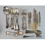 A small quantity of silver plated flatware including mother of pearl handled knives,