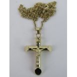 A crucifix on chain, stamped 925 throughout, pendant 4cm inc bale.