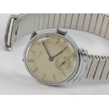 A WWII Cyma wristwatch having silvered dial with subsidiary seconds dial, engraved 'From M to W 16.