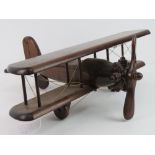 A wooden model of an Aeroplane having rotating propeller, 50cm wingspan.