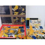 A quantity of assorted Meccano parts, in associated box.