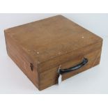 A wooden tool box having side clasps and top handle, 35.5 x 35 x 15cm.