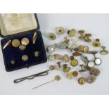 A quantity of assorted vintage shirt studs and cufflinks, a yellow metal tie pin,