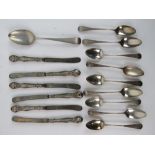 Nine HM silver tea spoons (indistinct marks) together with a single desert spoon and six silver