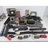 A quantity of Hornby model railway carriages, control units, etc. Some in original packaging.