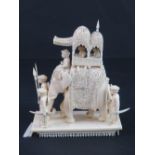 A finely carved and detailed mid 19th century ivory model of an Indian Elephant,
