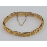 A 9ct gold articulated bracelet,