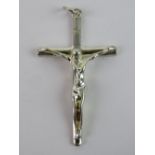 A large crucifix, 6.5cm in length inc bale, stamped 925.