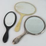 A HM silver dressing table hand mirror having engine turned engraved pattern to back,