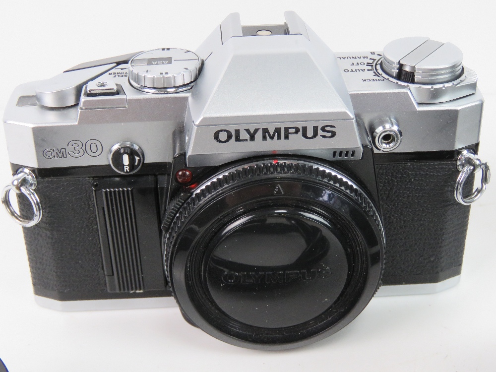 An Olympus OM30 SLR camera together with Olympus 50mm lens, Sigma mini-wide II 1:28 dia - 52 lens, - Image 2 of 5