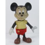 A vintage plasticised Mickey Mouse figurine c1950-60s, made by Walt Disney Productions,