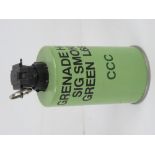 An inert British L68A1 smoke grenade (green).