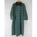 A reproduction WWII German Great Coat.