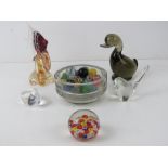 A quantity of glass paperweights two in the style of Wedgwood being a duck and another bird,