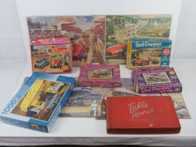 Four assorted and completed jigsaw puzzles with boxes (two a/f).