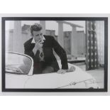 A contemporary photographic print of James Dean having facsimile signature upon,