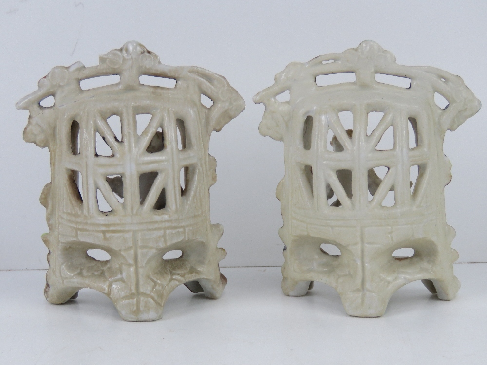A pair of lattice ware ceramic figural garden floral encrusted seats with boy and girl upon, - Image 3 of 4