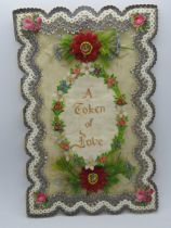 A Victorian 'A Token of Love' Sweetheart or Valentines card having message in gilt on fabric