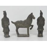 A pair of terracotta Chinese Warrior figurines, each standing 17cm high,