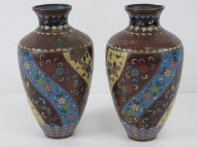 A pair of early 20thC cloisonné Canton enamel vases, a/f, each standing 19cm high.