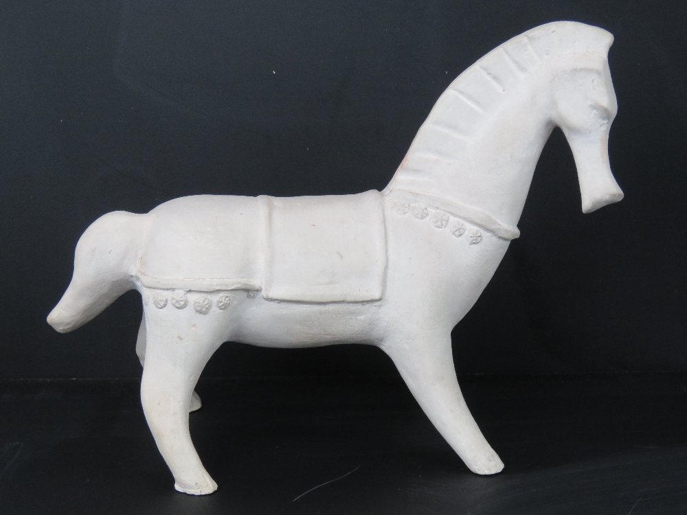 An Etruscan figurine of a horse approx 25cm in length.