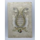 A decoupage Sweetheart or Valentines card having central Lyre design over paperlace 'I do this