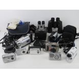 A quantity of cameras and binoculars inc a Poleroid Super Colour 635 CL, a Cannon Camcorder,