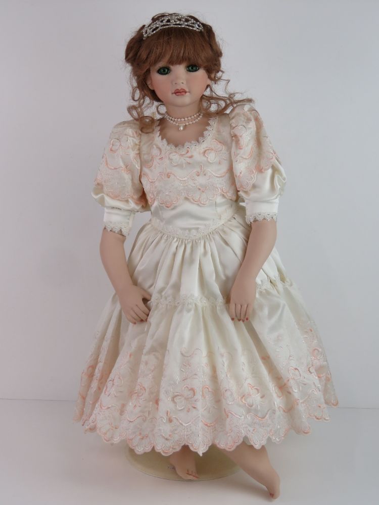 A rare collection of 20thC dolls - hand made using antique moulds, hand painted, with fine custom made outfits. Timed Online Only Sale.