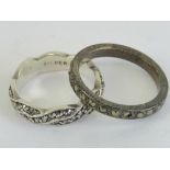 Two silver and marcasite rings, one being Sterling in plaited design size L,