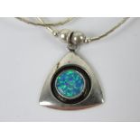 A 925 silver and opal pendant of geometric form on a Native American style beaded chain.