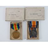 A WWI medal pair comprising War Medal and Victory Medal, both with original ribbons and packets,