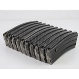 A quantity of AK47 magazines. Ten items.