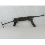 A deactivated M56 SMG SN 21786C.