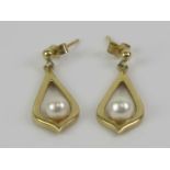 A pair of 9ct gold and pearl earrings, hallmarked 375, with butterfly backs, approx 2.5cm drop, 1.