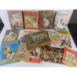 A quantity of vintage childrens books including Rupert the Bear, Sooty, Snow White, Noddy etc.
