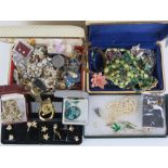 A quantity of vintage costume jewellery including a Trifari pendant.