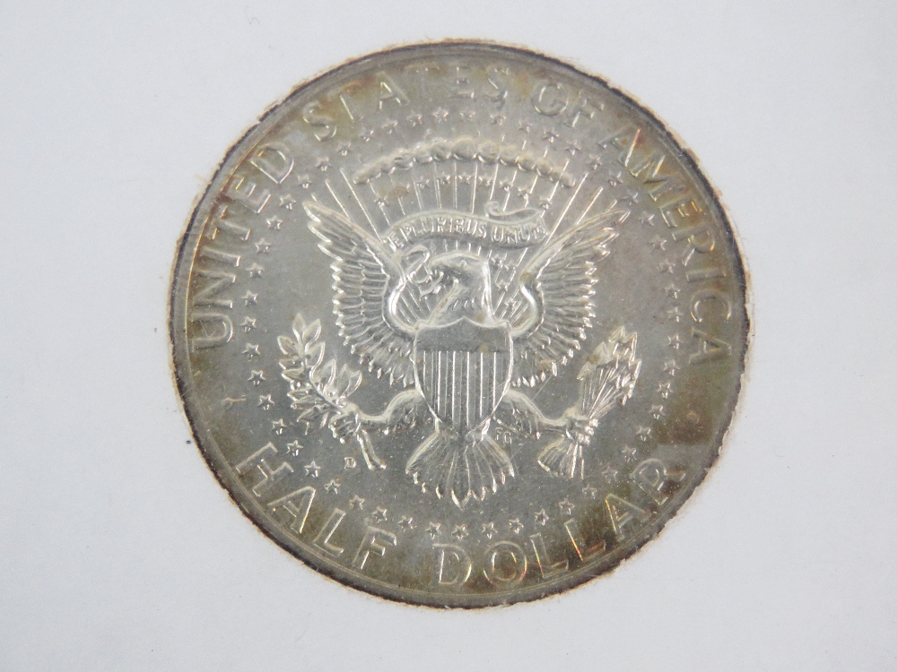 A John Fitzgerald Kennedy (JFK) 1917-1963 commemorative 1964 half dollar coin in plastic pod. - Image 3 of 3
