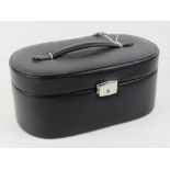 A contemporary black leather jewellery box, 26cm wide.