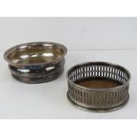 Two silver plated wine coasters, 12cm and 14.5cm dia respectively.