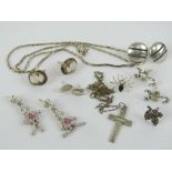 A quantity of silver and white metal jewellery including Sterling silver crucifix.