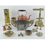 A quantity of assorted brass ware including a pair of graduated goffering iron stands and a WWI