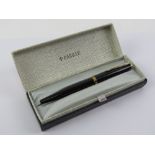 A Parker fountain pen in original box with original guarantee dated 1969 and additional cartridges.