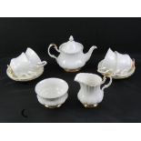 A Royal Albert tea set comprising teapot, jug, sugar and four cups and saucers, Val D'or pattern.